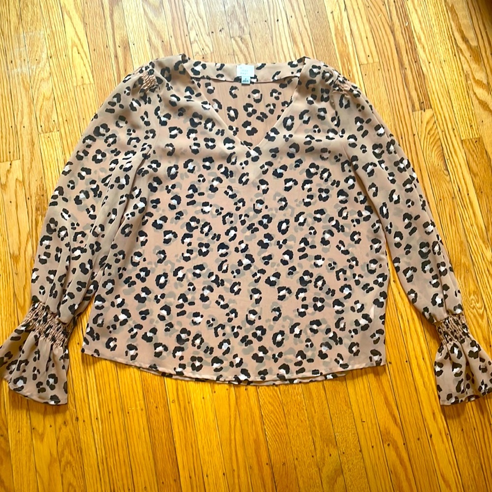 A New Day leopard print sheer blouse, size small, excellent condition.